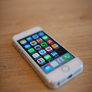 iPhone with apps displaying