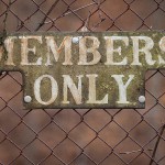 Members only sign on fence