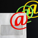email marketing, letter with email sybmol in postage location, challenges with email marketing